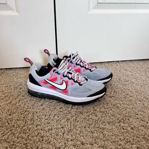 Nike Air Max tennis shoes. Youth size 7 but is the same as a women’s 8.5.